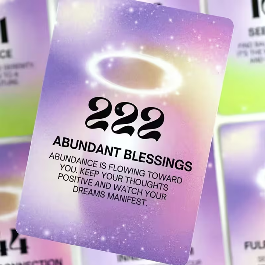 Card with '222 Abundant Blessings' text and motivational message on a colorful background