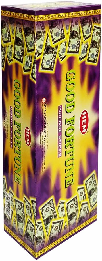 Box of 'Good Fortune' incense sticks with dollar bill design on a purple and yellow background.