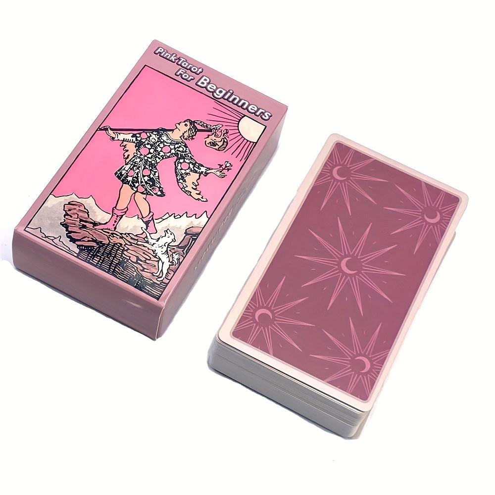 Pink tarot card set with packaging on a white background